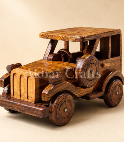 Vintage wooden Jeep model showing front grille and side-mounted spare wheel