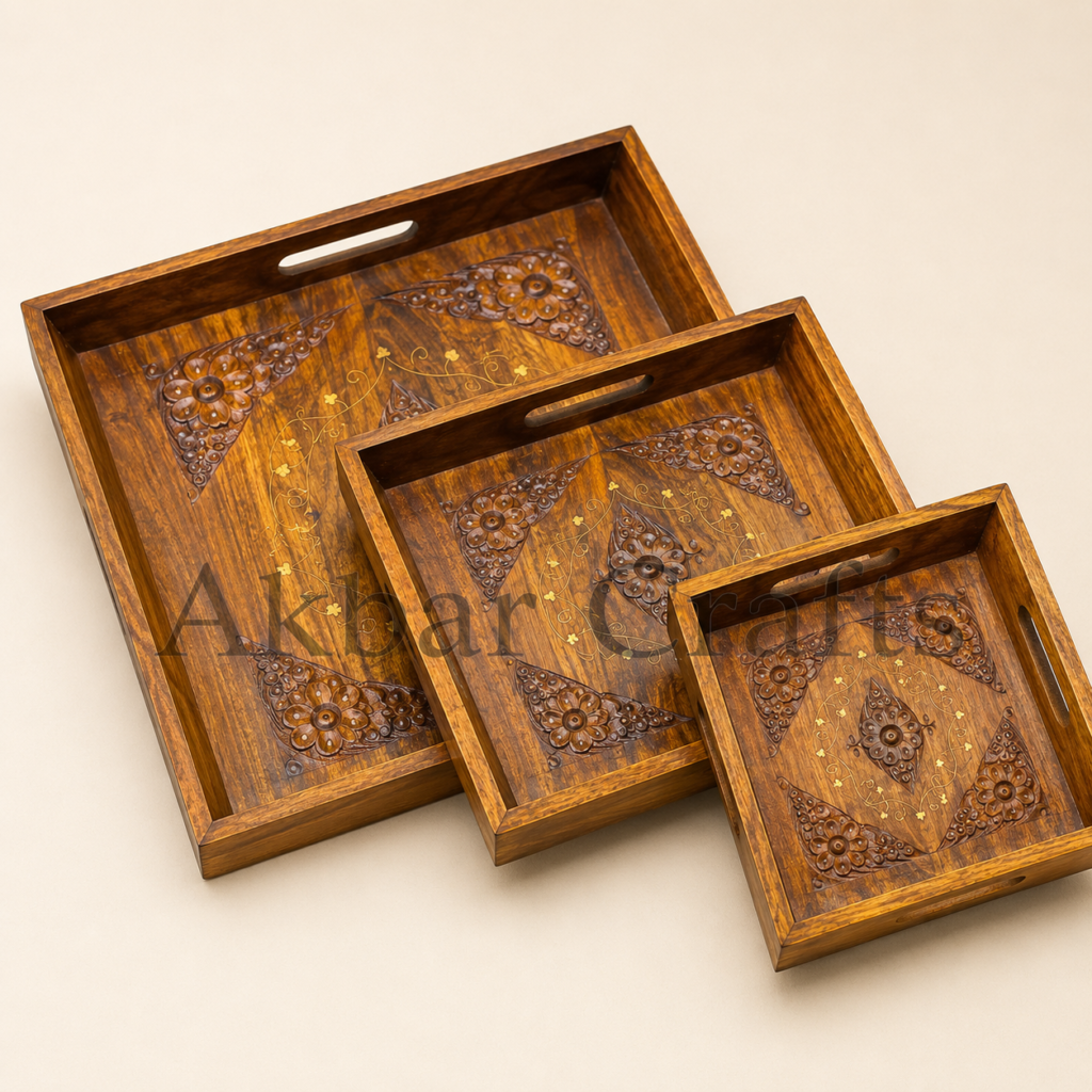 Sheesham wooden serving trays holding tea cups glasses and dates